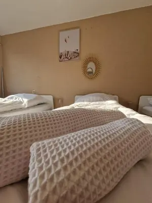 Ein Bett oder Betten in einem Zimmer der Unterkunft Dorey Home HN3 - WLAN - Cozy