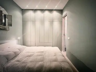 Ein Bett oder Betten in einem Zimmer der Unterkunft House of Art