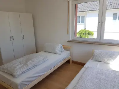Ein Bett oder Betten in einem Zimmer der Unterkunft Bockstalstr 59a 20a