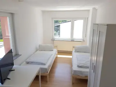 Ein Bett oder Betten in einem Zimmer der Unterkunft Bockstalstr 59a 20a