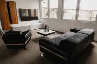 Ein Sitzbereich in der Unterkunft Goldstadt-Loft