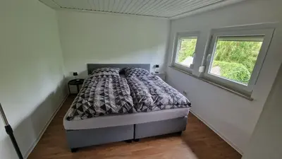 Ein Bett oder Betten in einem Zimmer der Unterkunft Ferienwohnung Forchtenberg