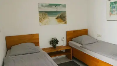Ein Bett oder Betten in einem Zimmer der Unterkunft Kleiner Elefant