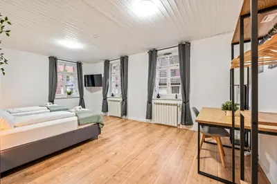 Ein Bett oder Betten in einem Zimmer der Unterkunft Übernachten im Kulturdenkmal - Weinort