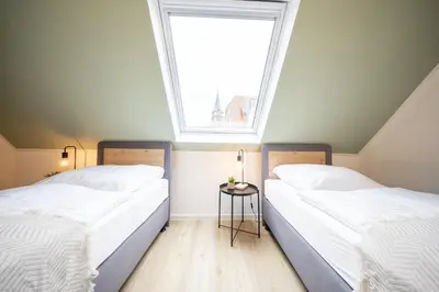Ein Bett oder Betten in einem Zimmer der Unterkunft CharmÖHR Homes