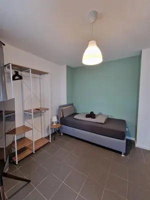 Ein Bett oder Betten in einem Zimmer der Unterkunft Amalfi A12 - 8 Betten - 4 Zimmer - neu renoviert!!