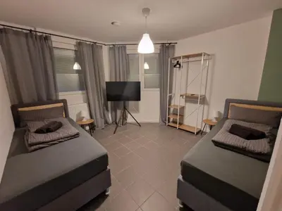 Ein Bett oder Betten in einem Zimmer der Unterkunft Amalfi A12 - 8 Betten - 4 Zimmer - neu renoviert!!