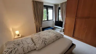 Ein Bett oder Betten in einem Zimmer der Unterkunft Bright & Cozy Apartment in Mainaschaff