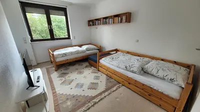 Ein Bett oder Betten in einem Zimmer der Unterkunft Bright & Cozy Apartment in Mainaschaff