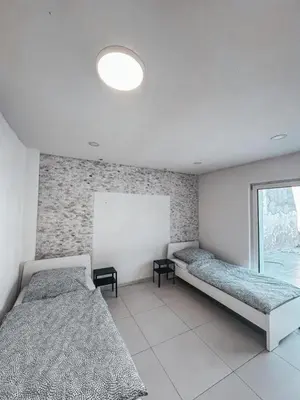 Ein Bett oder Betten in einem Zimmer der Unterkunft Neuhofen Stay