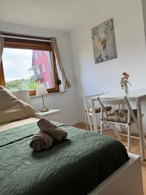 Ein Bett oder Betten in einem Zimmer der Unterkunft Haus Schömberg