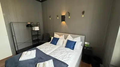 Ein Bett oder Betten in einem Zimmer der Unterkunft Kings und Queens - 2SZ - Whirlpool - Terrasse - Grill