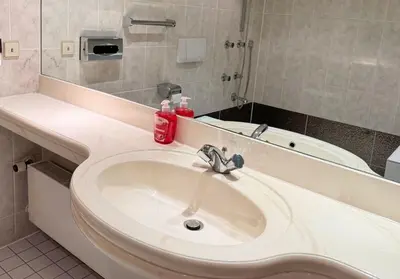 Ein Badezimmer in der Unterkunft Penthouse Apartment Zentral mit Goldstadtblick