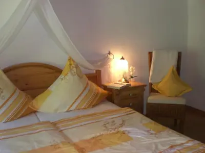 Ein Bett oder Betten in einem Zimmer der Unterkunft Ferienwohnung Meyerhöfer