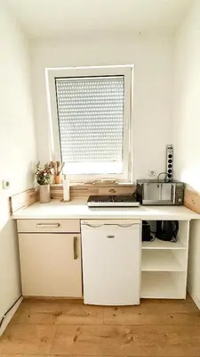 Küche/Küchenzeile in der Unterkunft Benmey Apartment Küche,TV,Waschmaschine