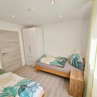 Ein Bett oder Betten in einem Zimmer der Unterkunft Ferienwohnung Popp Langen