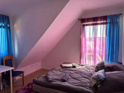 Ein Bett oder Betten in einem Zimmer der Unterkunft Guest House BiBi-Lux