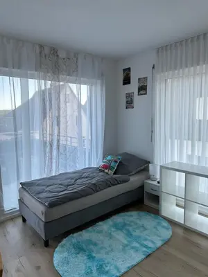 Ein Bett oder Betten in einem Zimmer der Unterkunft Guest House BiBi-Lux