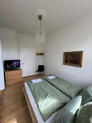 Ein Bett oder Betten in einem Zimmer der Unterkunft Grand Apartment Worms - Stilvolles Wohnen im Zentrum