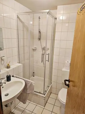 Ein Badezimmer in der Unterkunft City Apartment