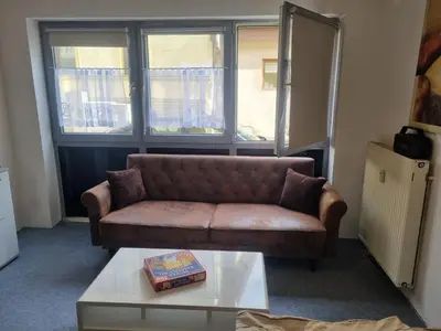 Ein Sitzbereich in der Unterkunft City Apartment