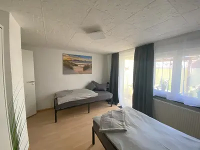 Ein Bett oder Betten in einem Zimmer der Unterkunft Ferienhaus Engelsgasse