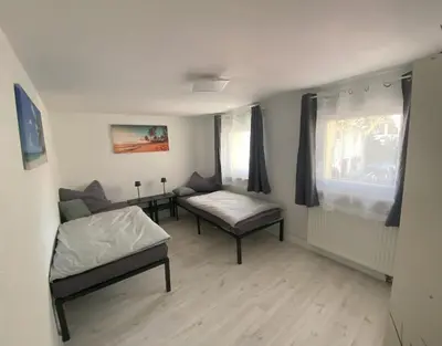Ein Bett oder Betten in einem Zimmer der Unterkunft Ferienhaus Engelsgasse
