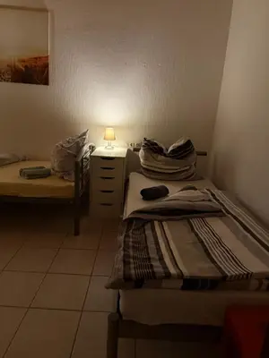 Ein Bett oder Betten in einem Zimmer der Unterkunft Sonnenblick Kleiberweg