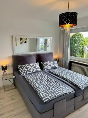 Ein Bett oder Betten in einem Zimmer der Unterkunft Sunset Suite mit Weitblick