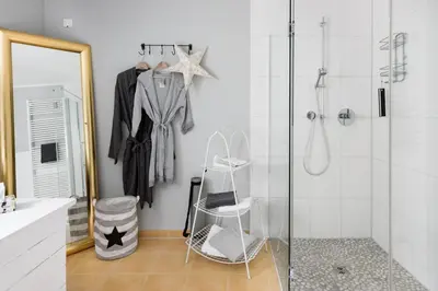 Ein Badezimmer in der Unterkunft Gemütliches Zuhause im Souterrain - Masblanche No 1