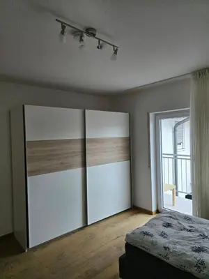 Ein Bett oder Betten in einem Zimmer der Unterkunft Moderne großzügige Wohnung zu vermieten