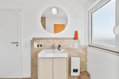 Ein Badezimmer in der Unterkunft WHONAP - Stadhûs I Küche I Zentral I A81 I Business