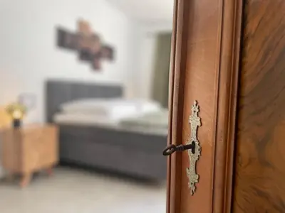 Ein Bett oder Betten in einem Zimmer der Unterkunft Ferienwohnung Nostalgic In der Nähe von Sinsheim Apartmenthaus Traudl