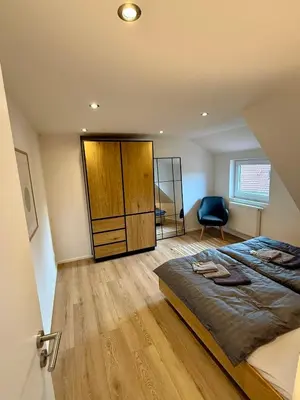 Ein Bett oder Betten in einem Zimmer der Unterkunft Lupi Blue - stylish und cosy Apartment