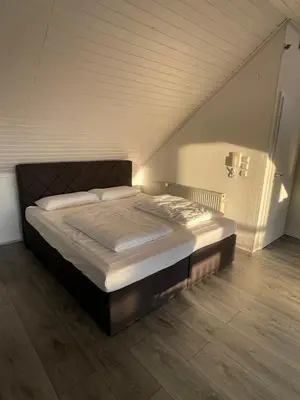 Ein Bett oder Betten in einem Zimmer der Unterkunft Ferienwohnung Panoramablick 1