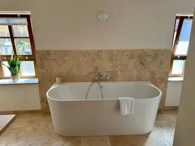 Ein Badezimmer in der Unterkunft Neue Neunzehn - Stadthaus, 2DZ, 2Bäder, Kamin