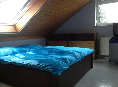 Ein Bett oder Betten in einem Zimmer der Unterkunft HomeStay Sandra