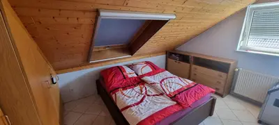 Ein Bett oder Betten in einem Zimmer der Unterkunft HomeStay Sandra