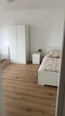 Ein Bett oder Betten in einem Zimmer der Unterkunft Monteurwohnung und Ferienwohnung Mannheim