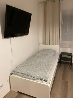Ein Bett oder Betten in einem Zimmer der Unterkunft Monteur- und Ferienwohnung Mannheim