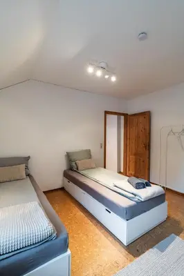 Ein Bett oder Betten in einem Zimmer der Unterkunft Apt7 - Ferienwohnung Brötzingen