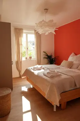 Ein Bett oder Betten in einem Zimmer der Unterkunft Urlaub in der Glückskoje - 2 SZ, Wintergarten, Haustiere willkommen