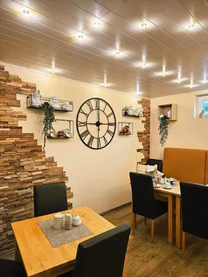 Ein Sitzbereich in der Unterkunft Kleines Landhaus Wendel