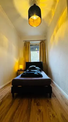 Ein Bett oder Betten in einem Zimmer der Unterkunft 3-room apartment with parking space Sleepomat