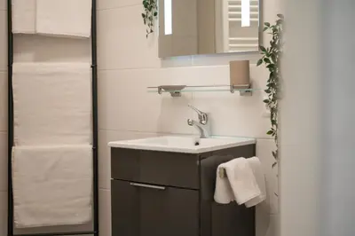 Ein Badezimmer in der Unterkunft Goldstadt Mosaik Apartment