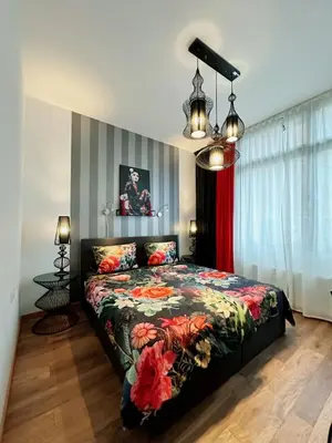 Ein Bett oder Betten in einem Zimmer der Unterkunft High Level Apartment
