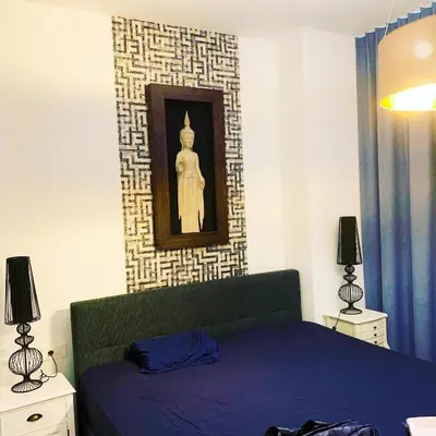 Ein Bett oder Betten in einem Zimmer der Unterkunft High Level Apartment