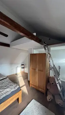 Ein Bett oder Betten in einem Zimmer der Unterkunft Nest & Rest Homes