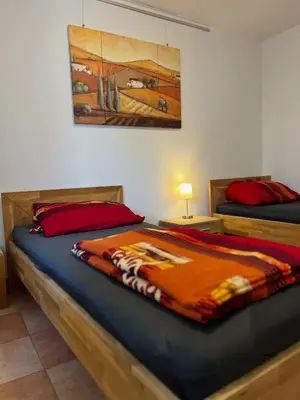 Ein Bett oder Betten in einem Zimmer der Unterkunft Nest & Rest Homes