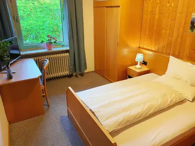 Ein Bett oder Betten in einem Zimmer der Unterkunft Zum Goldenen Löwen